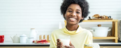 Child,Having,Breakfast.,Happy,Cute,African-american,Boy,Drinking,Milk,And